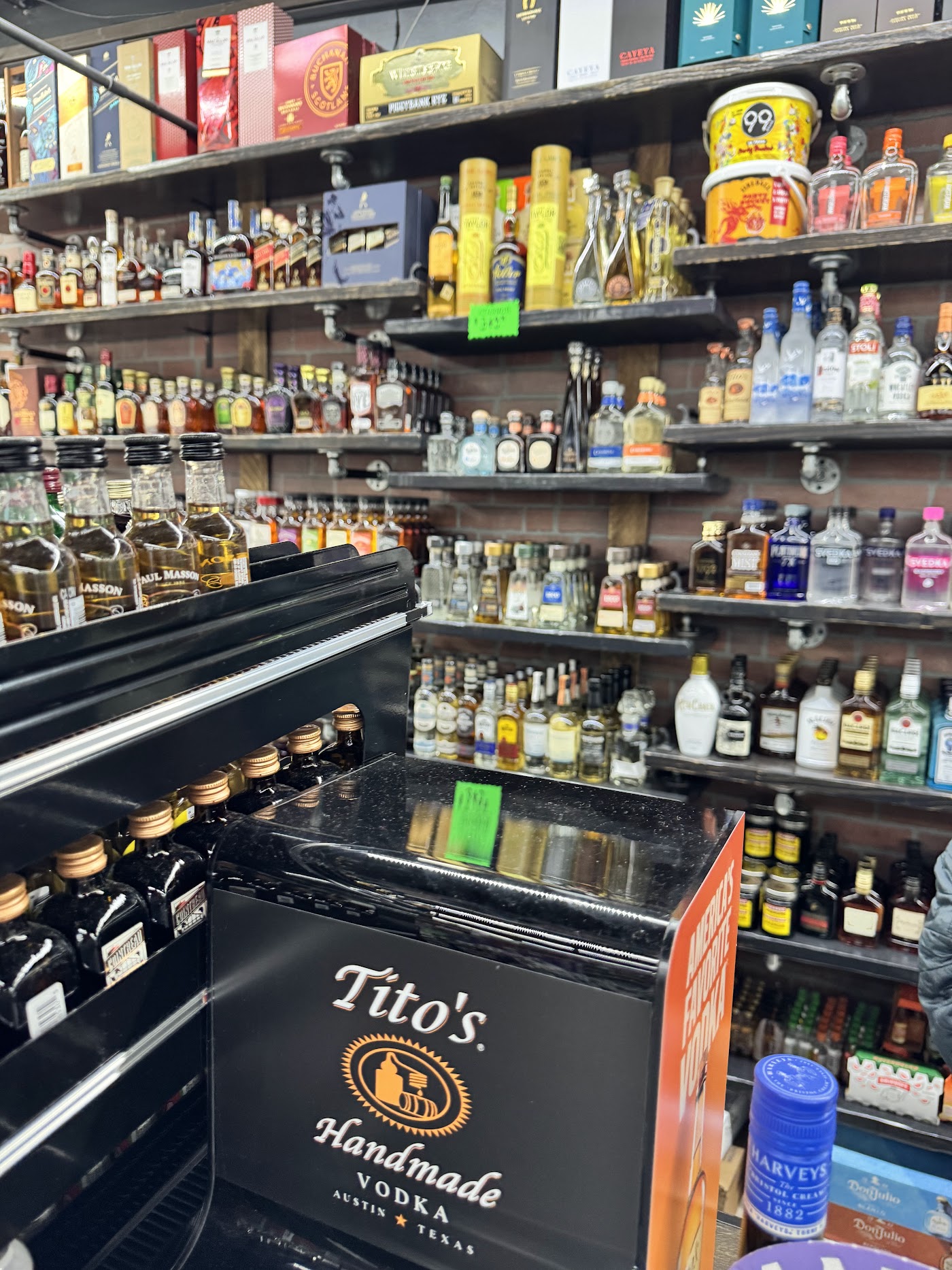 Shelves of liquor bottles inside Tony's Spirits